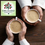 the best artisan coffee in two cups held by two people