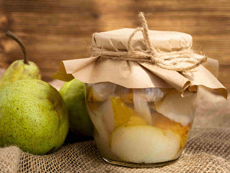 taste grabouw with this illustration of a pear and pear compote with rustic background