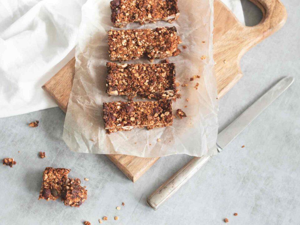 chocolate oat bars on wooden board as part of easy no bake baking