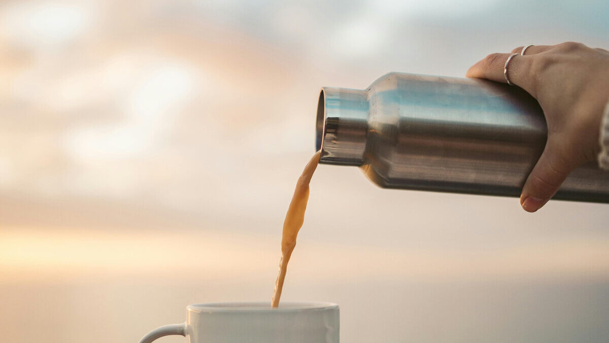 Published by Divine SEO on November 6, 2025 Categories Tags Why Your Stainless Steel Thermos Changes the Taste of Your Coffee illustrated by coffee being poured in a cup from steel thermos