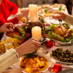 full table people enjoying festive farmstall feasts