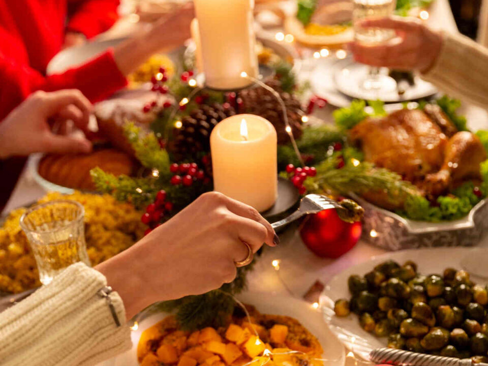full table people enjoying festive farmstall feasts