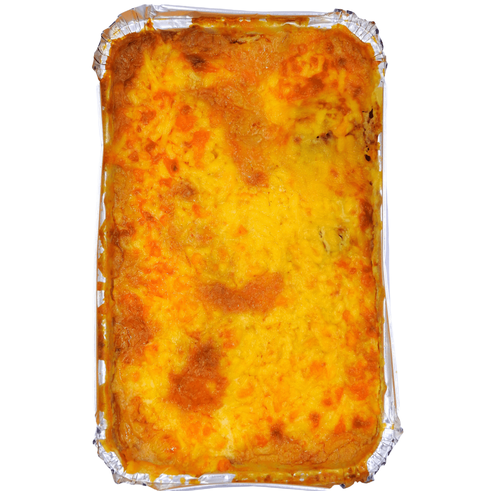 A close-up image of a baked lasagna dish served out of packaging, revealing hearty layers of meat sauce, creamy topping, and golden melted cheese, presented hot and inviting for a satisfying homemade-style meal.