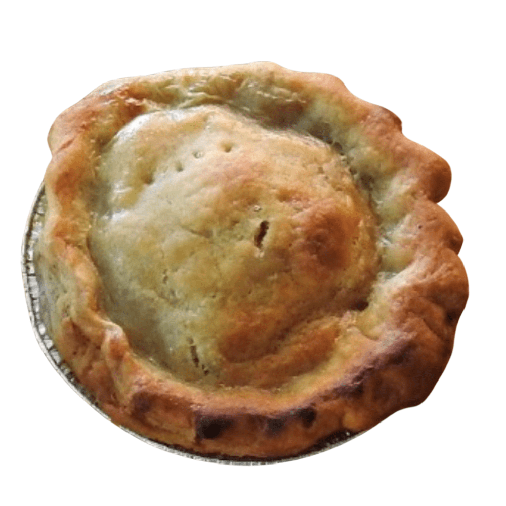 Savoury pie with a golden flaky pastry crust, filled with slow-cooked meats, vegetables, and rich gravy, presented warm and inviting as a hearty dish and without a background.
