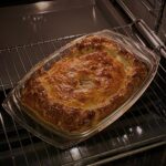 a golden pie baking in the over to illustrate good homemade pies
